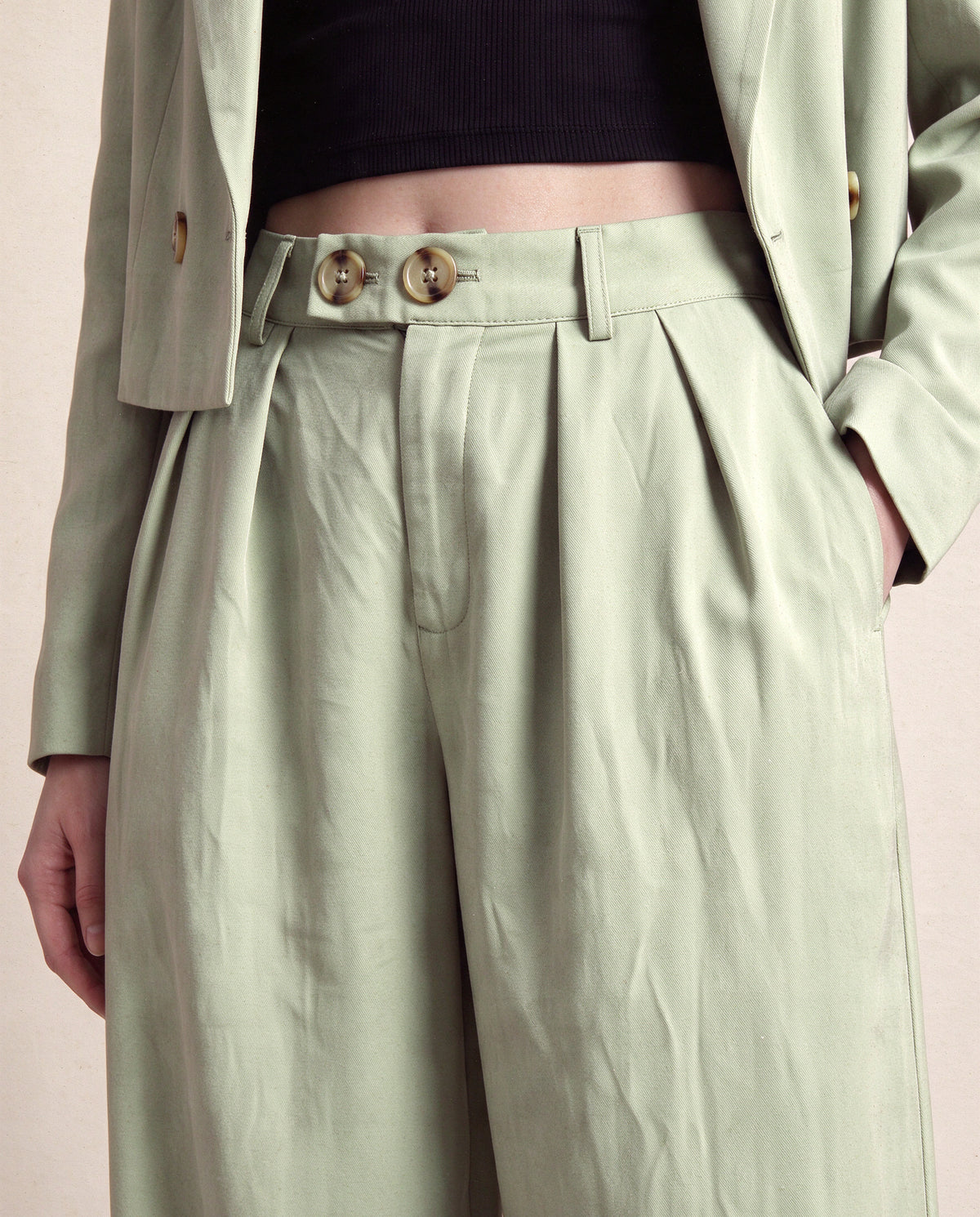 Ada Pants in Sage, waistband tab and pleats