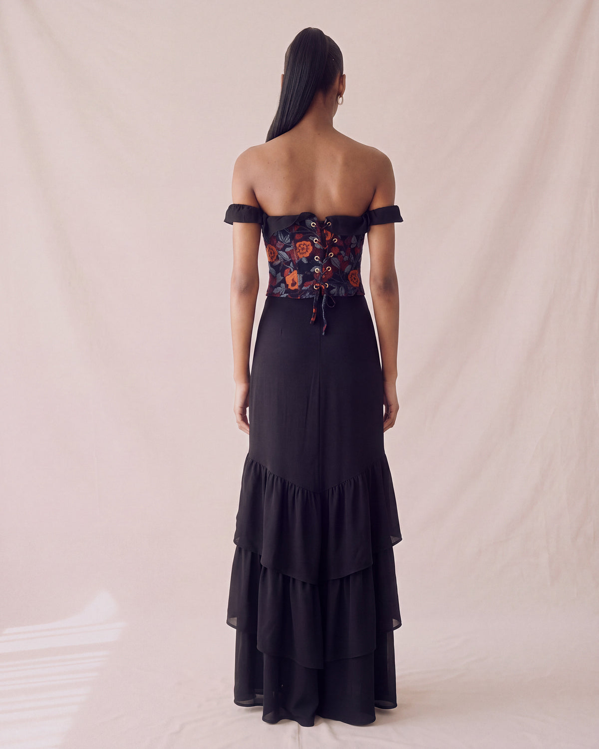 Rosalia Dress in Black Chiffon Satin, back view, worn with the Rosalia Corset