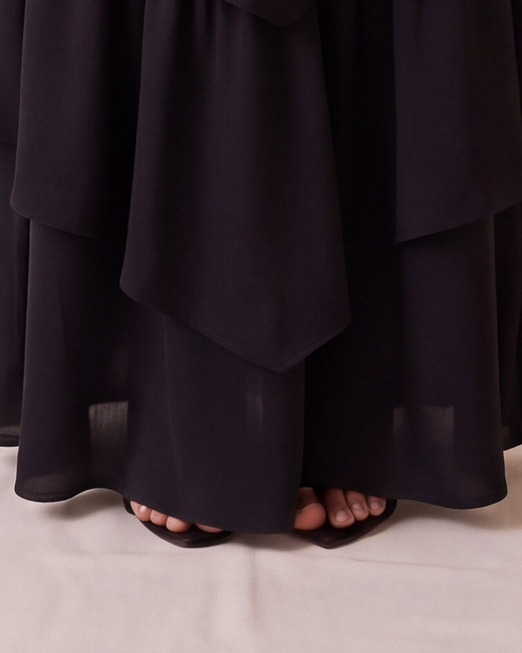 Rosalia Dress in Black Chiffon Satin, hem detail