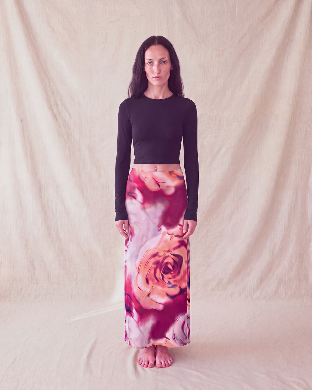 Bloom Skirt in rose print, a maxi slip skirt, worn with a black long sleeve top