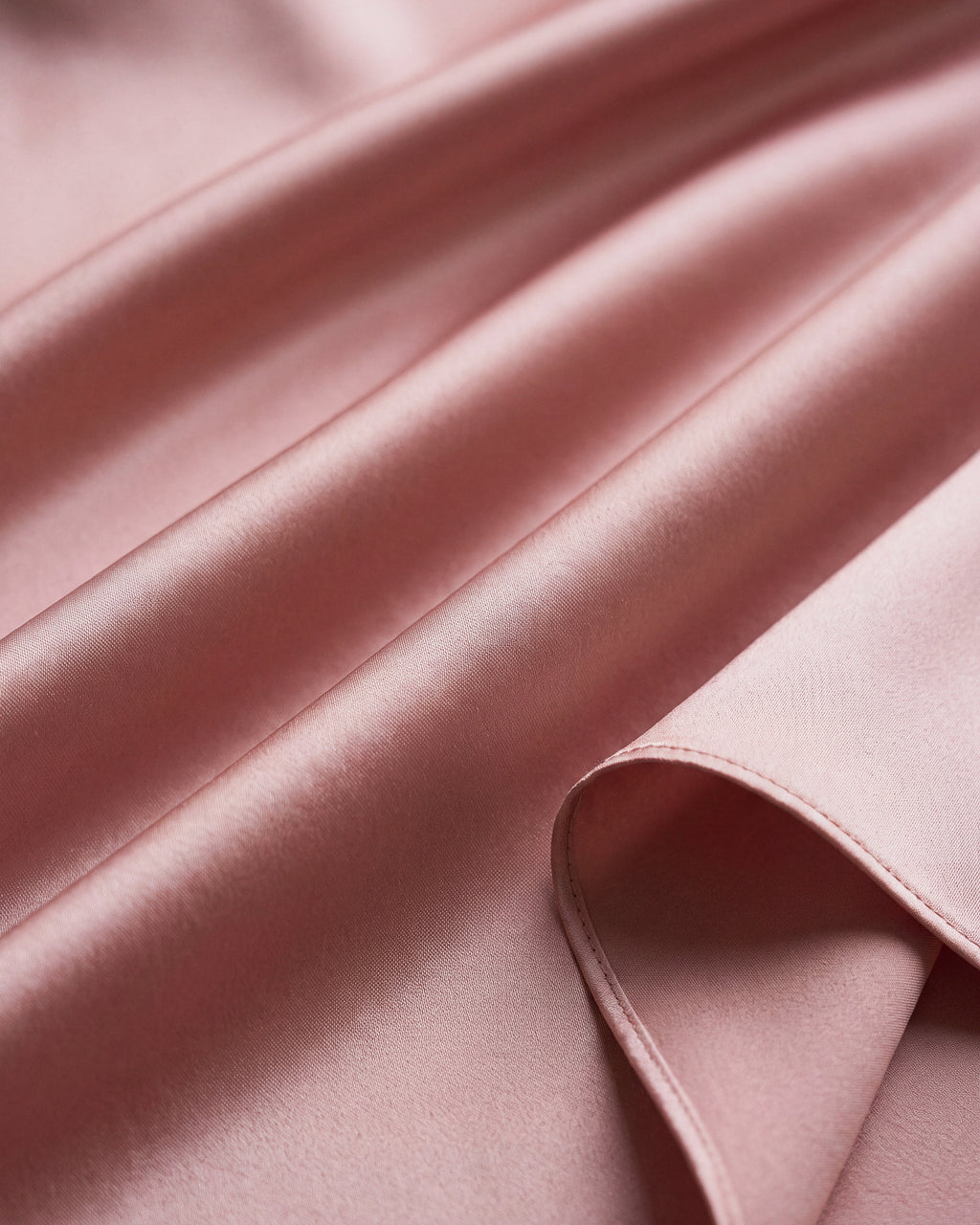 Idai Dress in Soft Pink satin, fabric close up