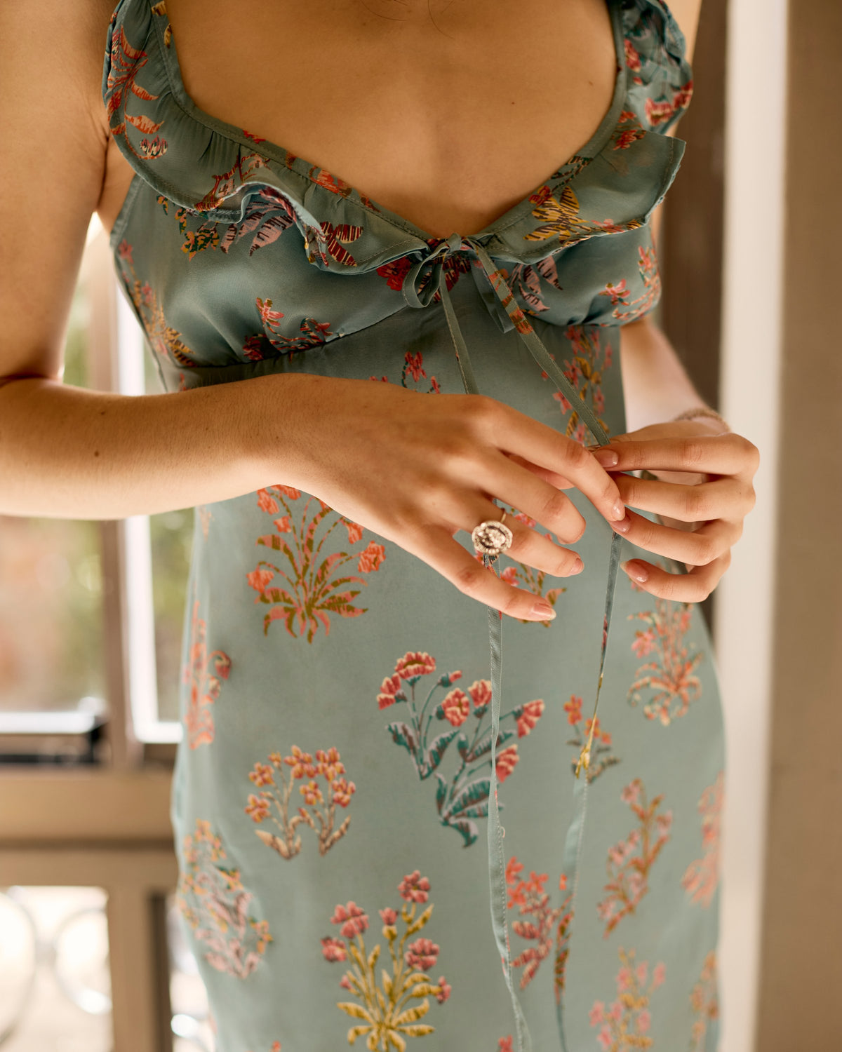 Ruffle neckline and tie of the Florence Dress Silk