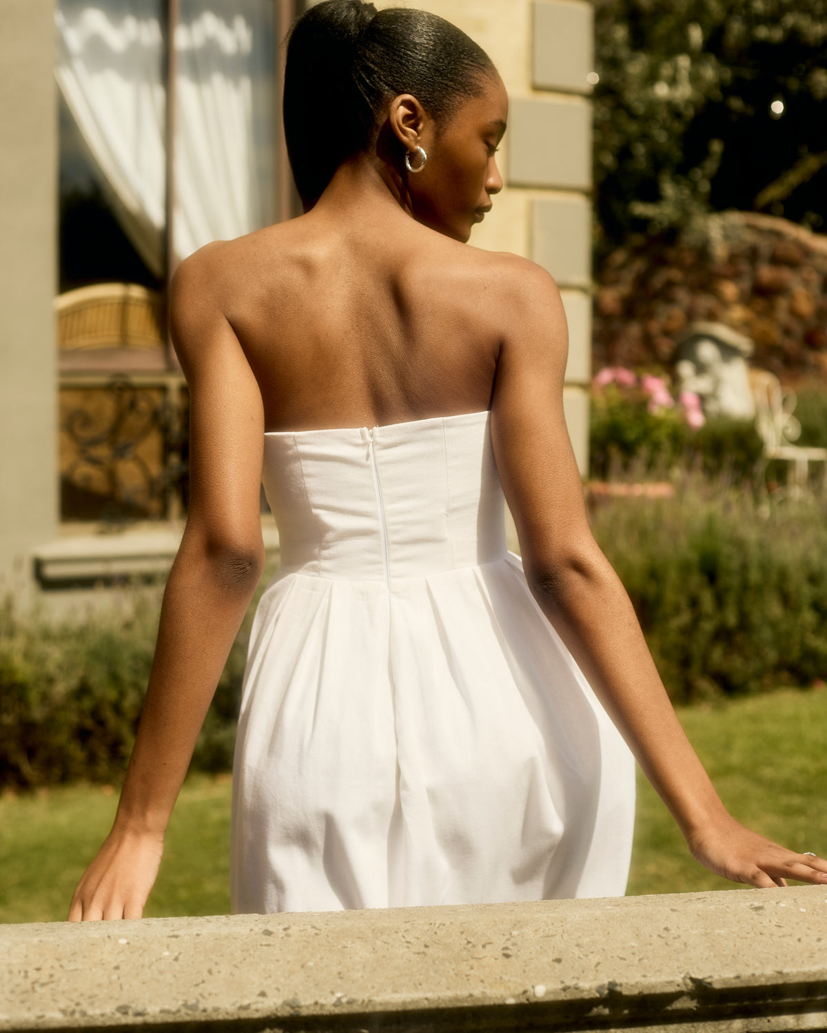 Back of the Juliette Dress in white linen