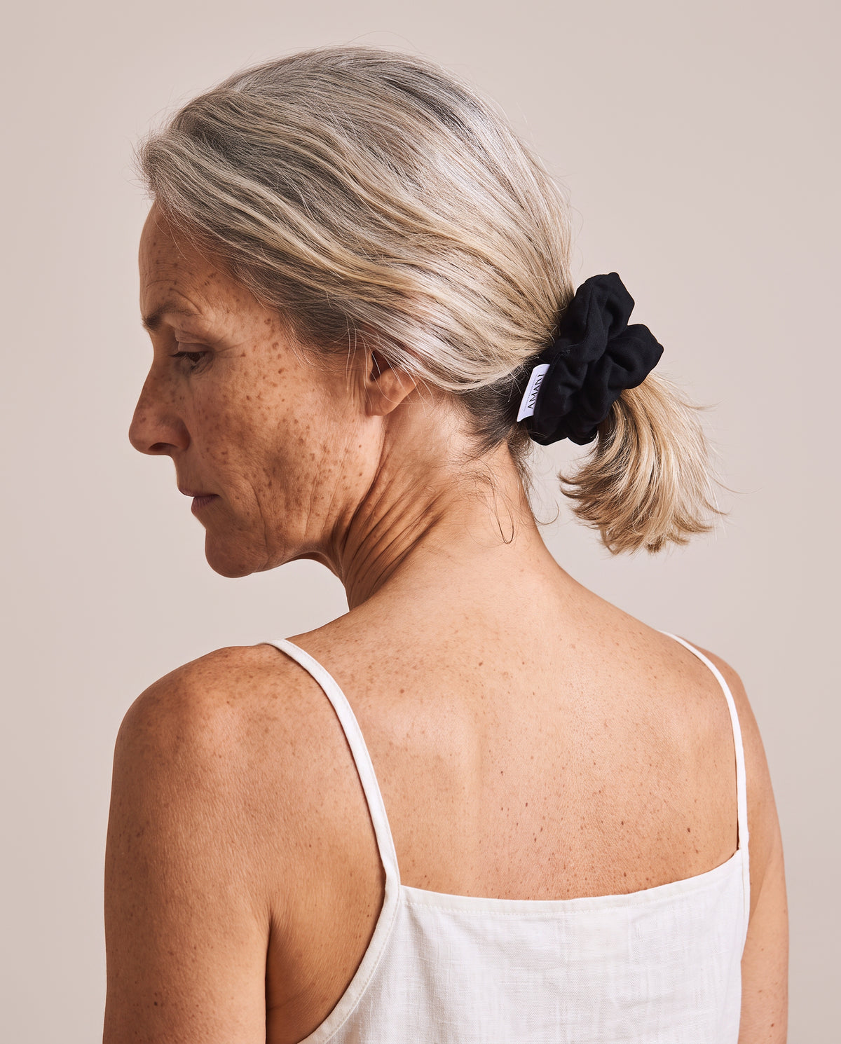 Bamboo Scrunchie in Black, in the hair