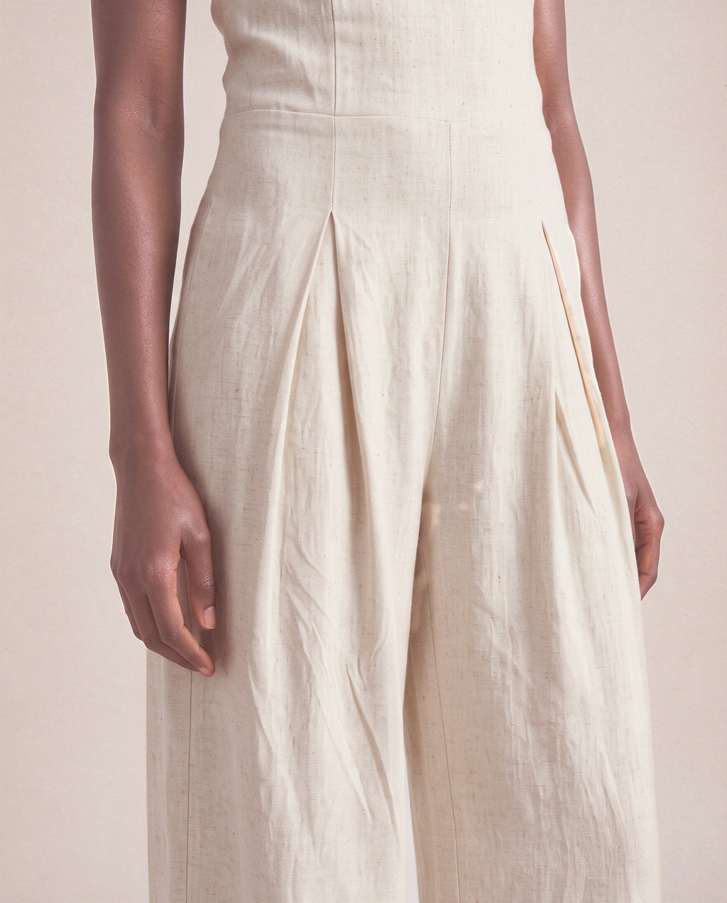 Camille Jumpsuit in Beige, front pleats